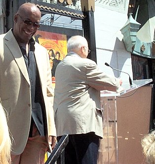 John smiles, Johnny speaks