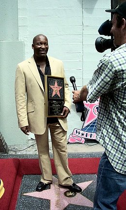 John talks to the press